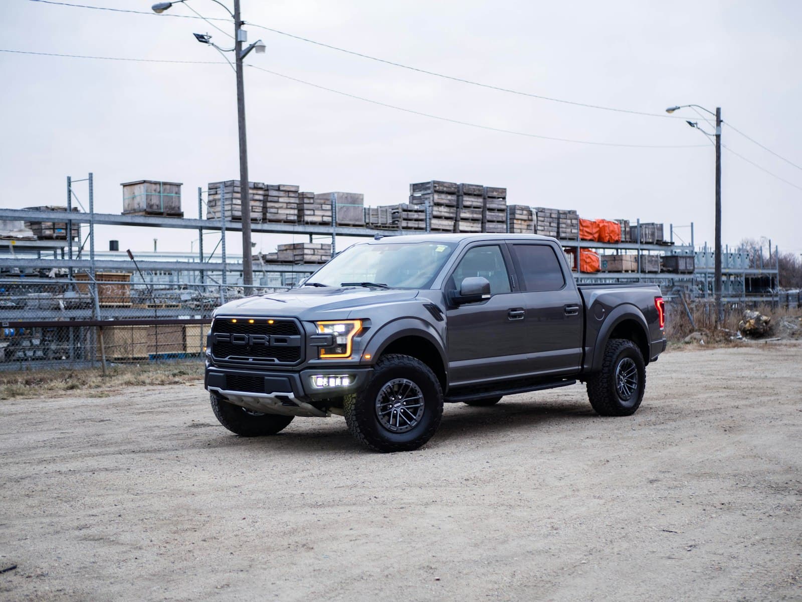 2019 Ford F-150 Raptor in Magnetic Gray, front three-quarter view
