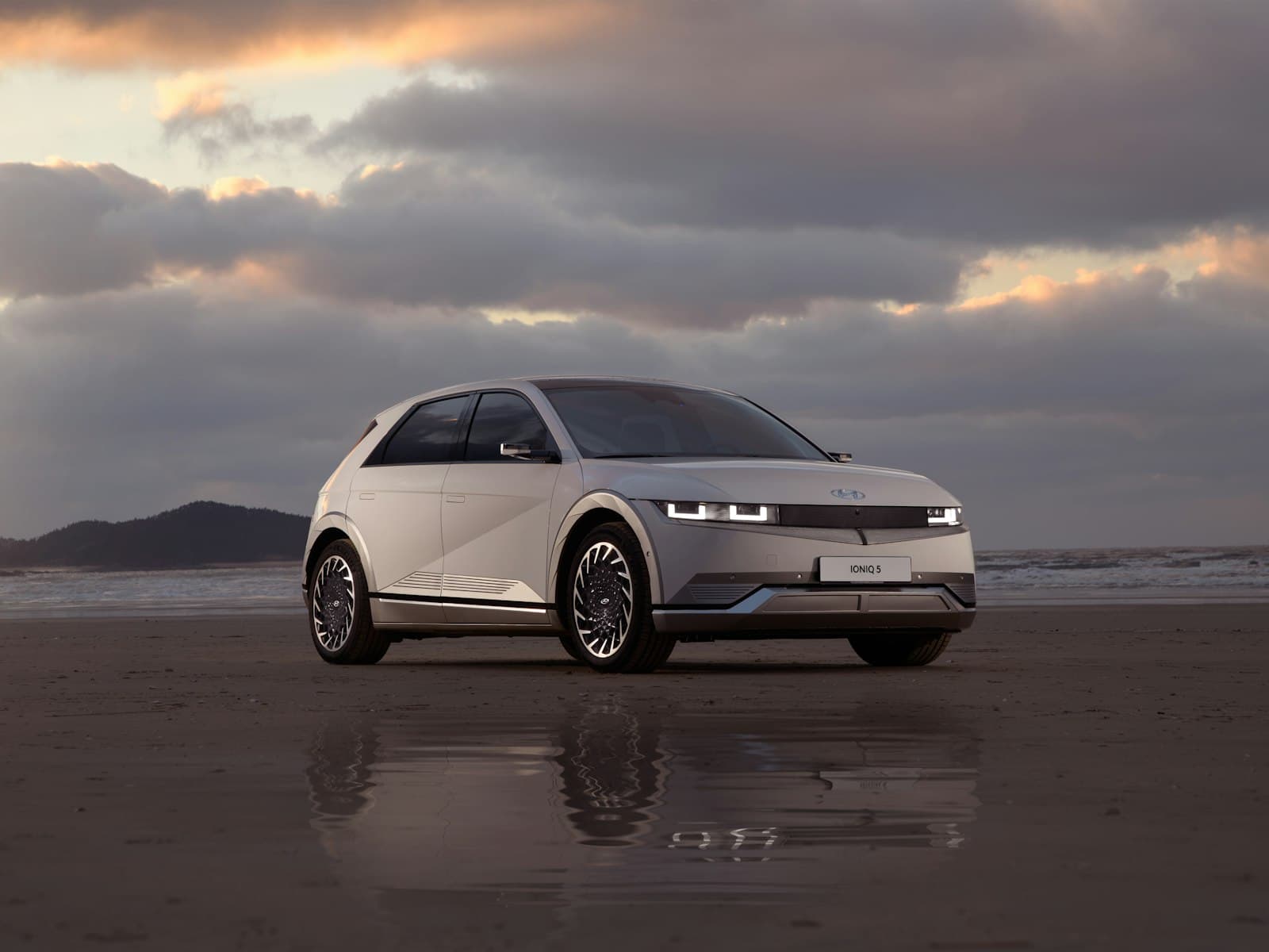 2023 Hyundai Ioniq 5 Limited in Cyber Gray on the beach at sunset