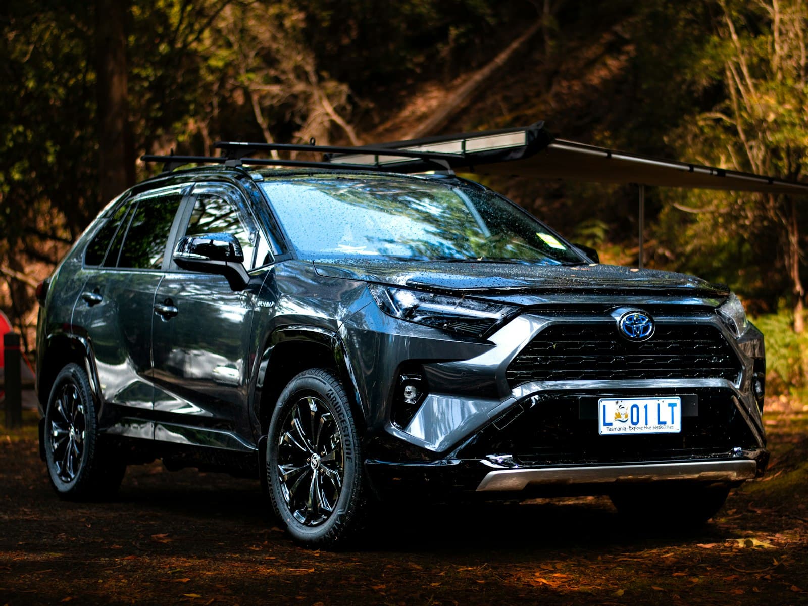 2023 Toyota RAV4 Hybrid XSE in Magnetic Gray with roof awning