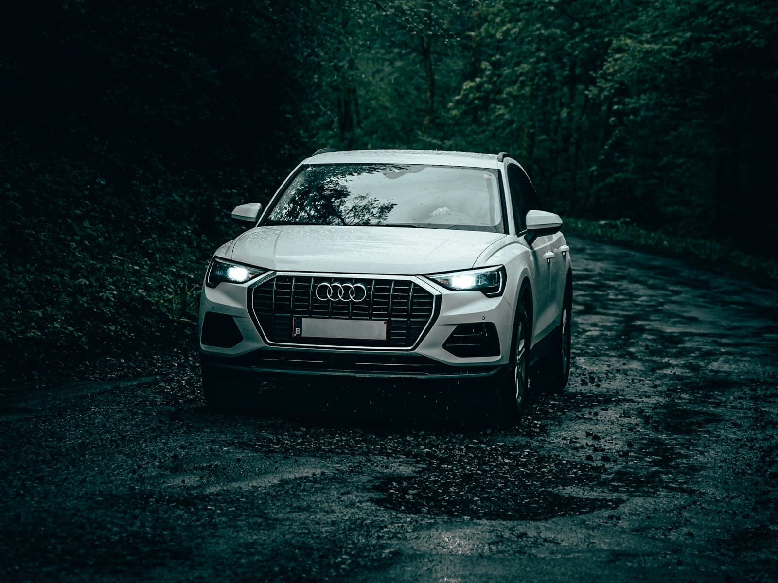 2021 Audi Q3 in Glacier White on a forest road