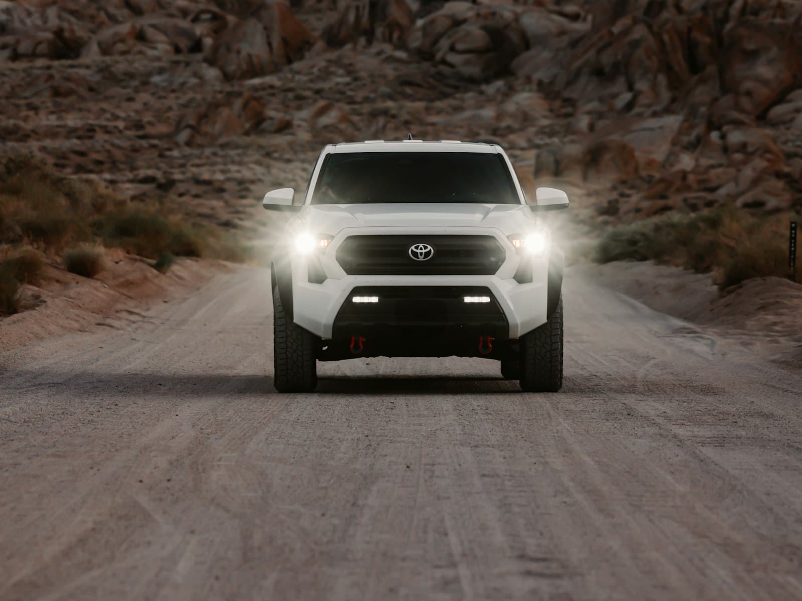 2024 Toyota Tacoma TRD Off-Road front view with lights on